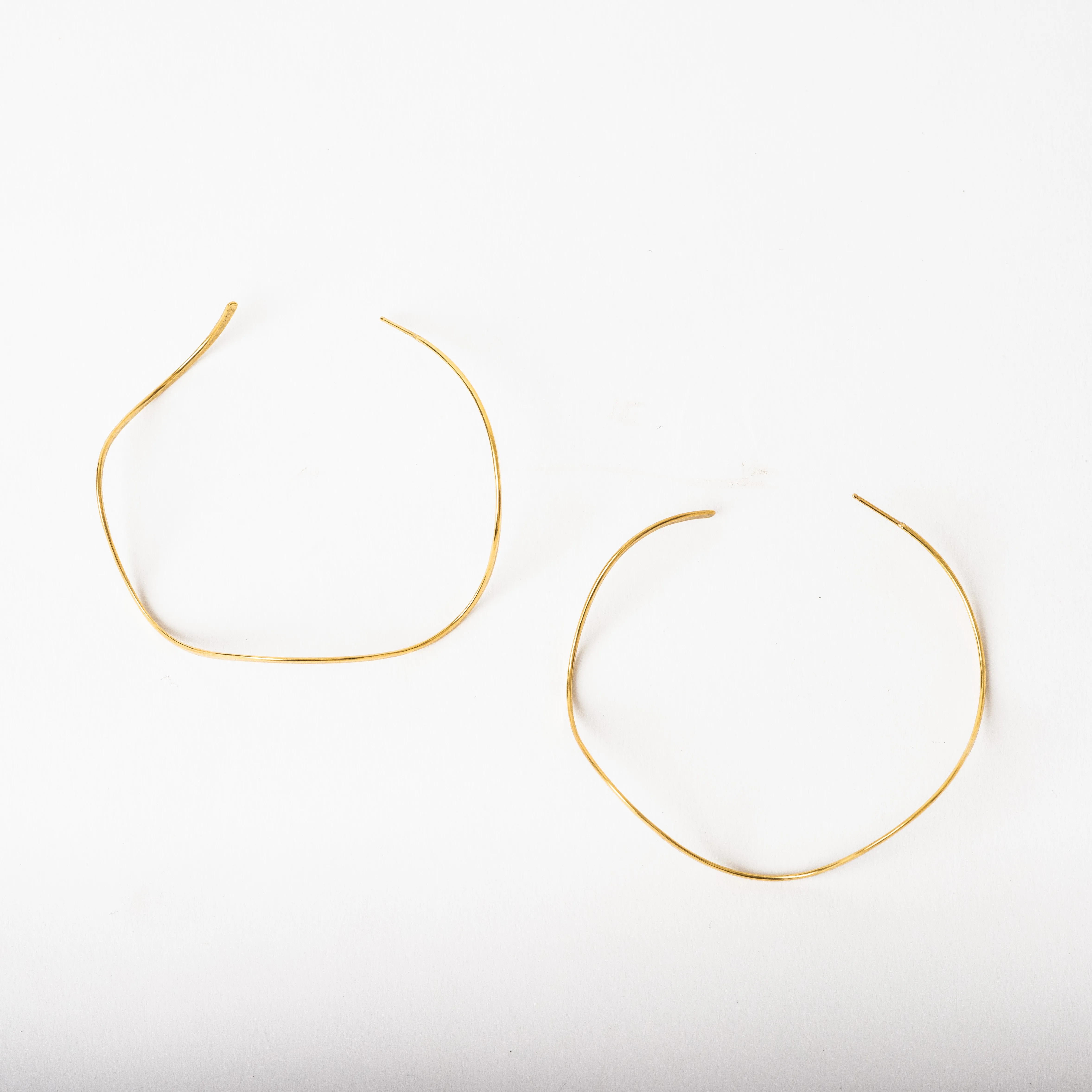 Wave Hoops, 19K Gold